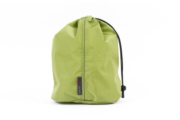 A Size 4 Moss (green with light green grid) 210 Cerylon Travel Stuff Sack.